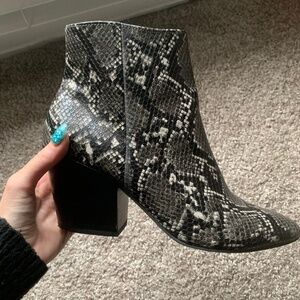Dolce vita  black snake print stella pointed zip up  heel boots